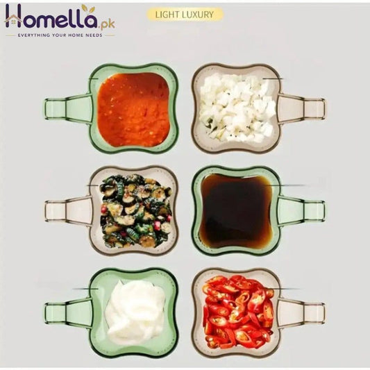 Set of glass containers with various food items on a light gray background