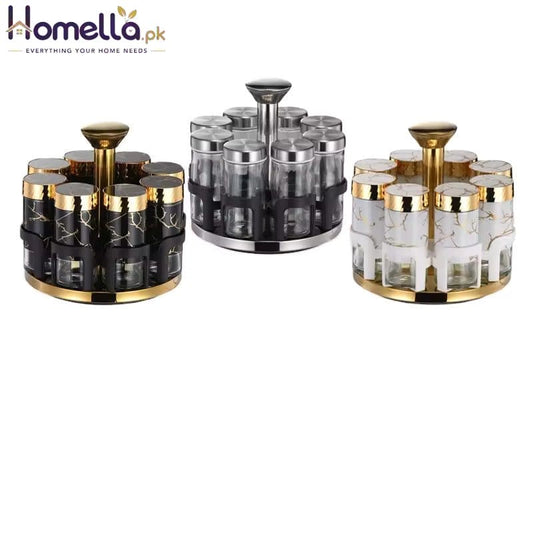 Set of three decorative canisters with gold and black accents on a white background