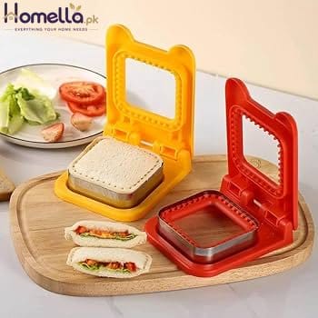 Yellow and red sandwich maker on a wooden board with ingredients.