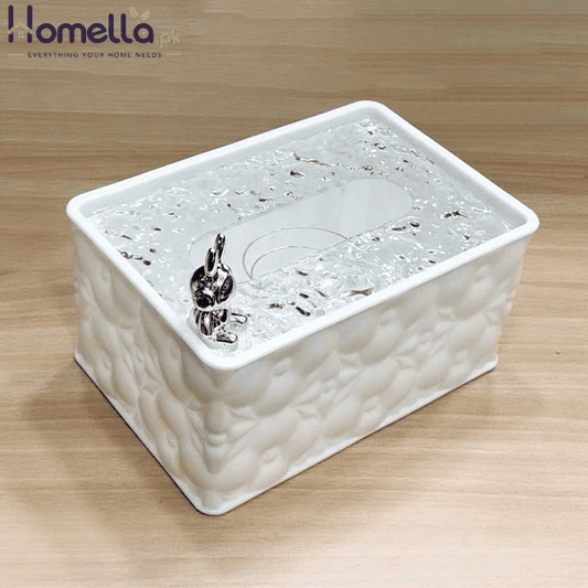 White textured pet water fountain on a wooden surface