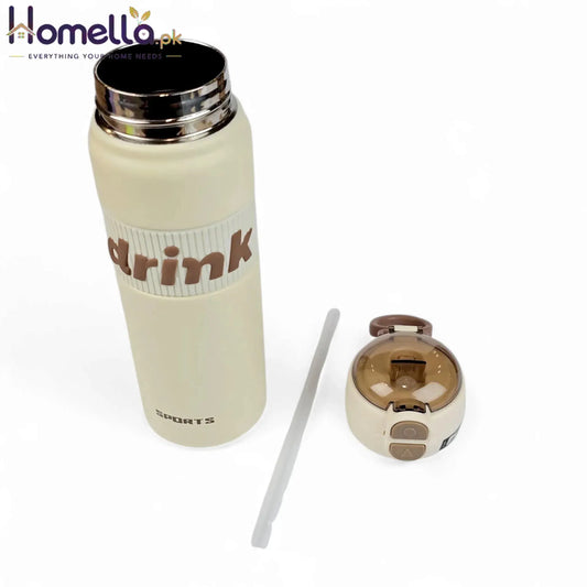 Beige water bottle with 'drink' text, straw, and cap on a white background
