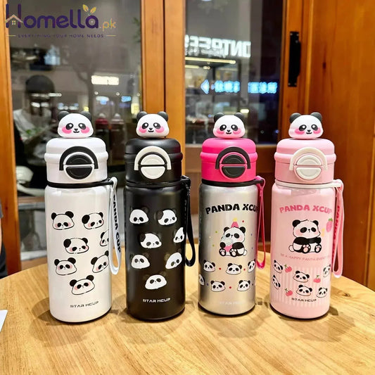Four panda-themed water bottles on a wooden table with a blurred indoor background.
