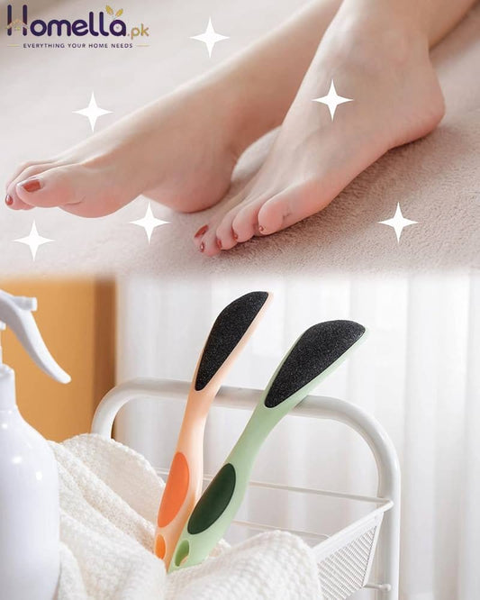 Colorful slippers with black soles on a bed with feet in the background
