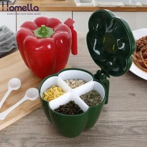 Green pepper-shaped container with compartments on a wooden surface