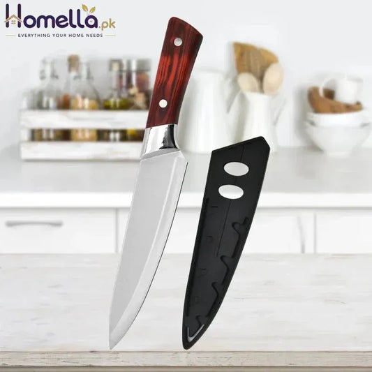 Chef's knife with a wooden handle and black sheath on a kitchen counter.