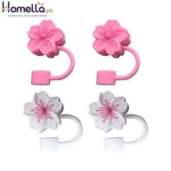 Two pairs of pink and white floral hair ties on a white background