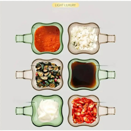 Set of glass containers with various food items on a light gray background