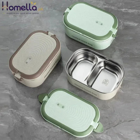 Set of three lunch boxes with different designs on a gray surface