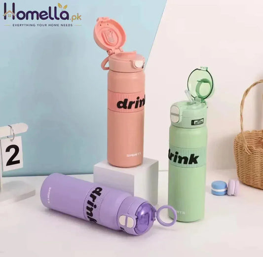 Three colorful water bottles with 'drink' text on a light background