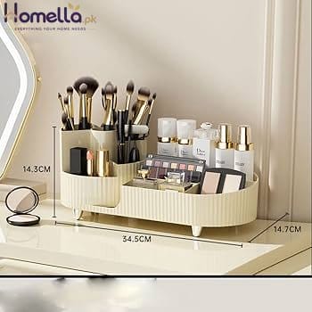 Makeup organizer with brushes and products on a reflective surface