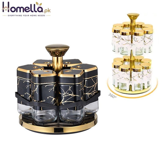 Spice rack with black and gold containers on a white background