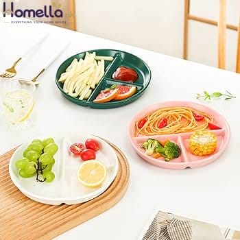 Three divided plates with food on a table
