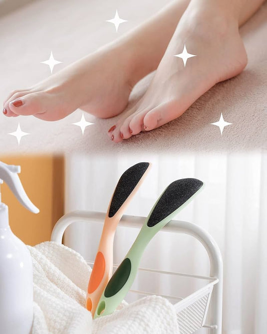 Colorful slippers with black soles on a bed with feet in the background