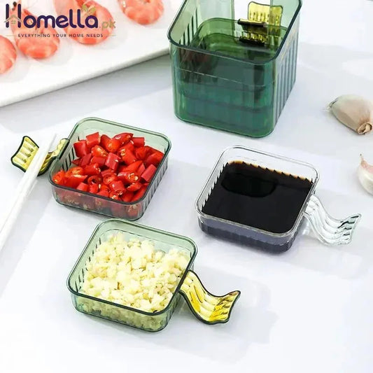 Set of glass condiment containers with food on a white surface