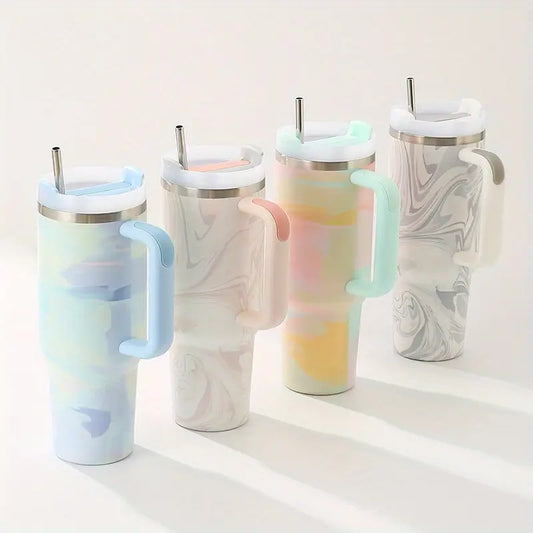 Set of five insulated travel mugs with handles and straws on a white background